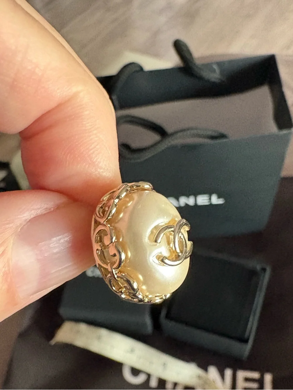 CHANEL Pearl Gold tone  Logo Stud Earrings barely used new condition.